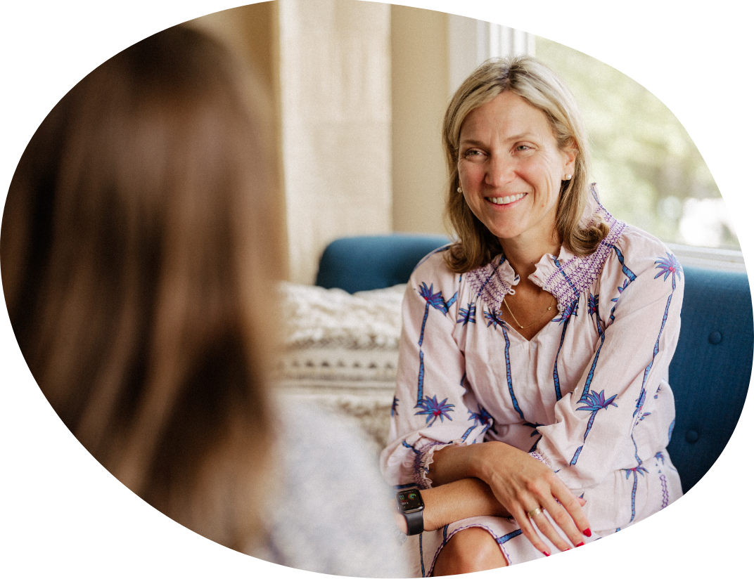 happy woman patient talking with therapist