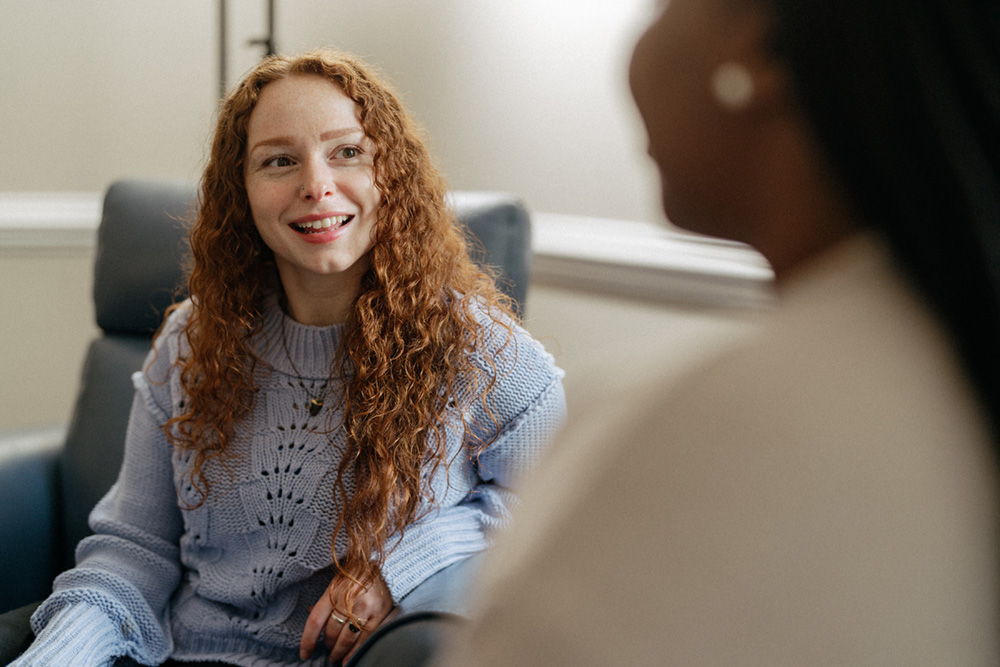 Counselor listening to a patient
