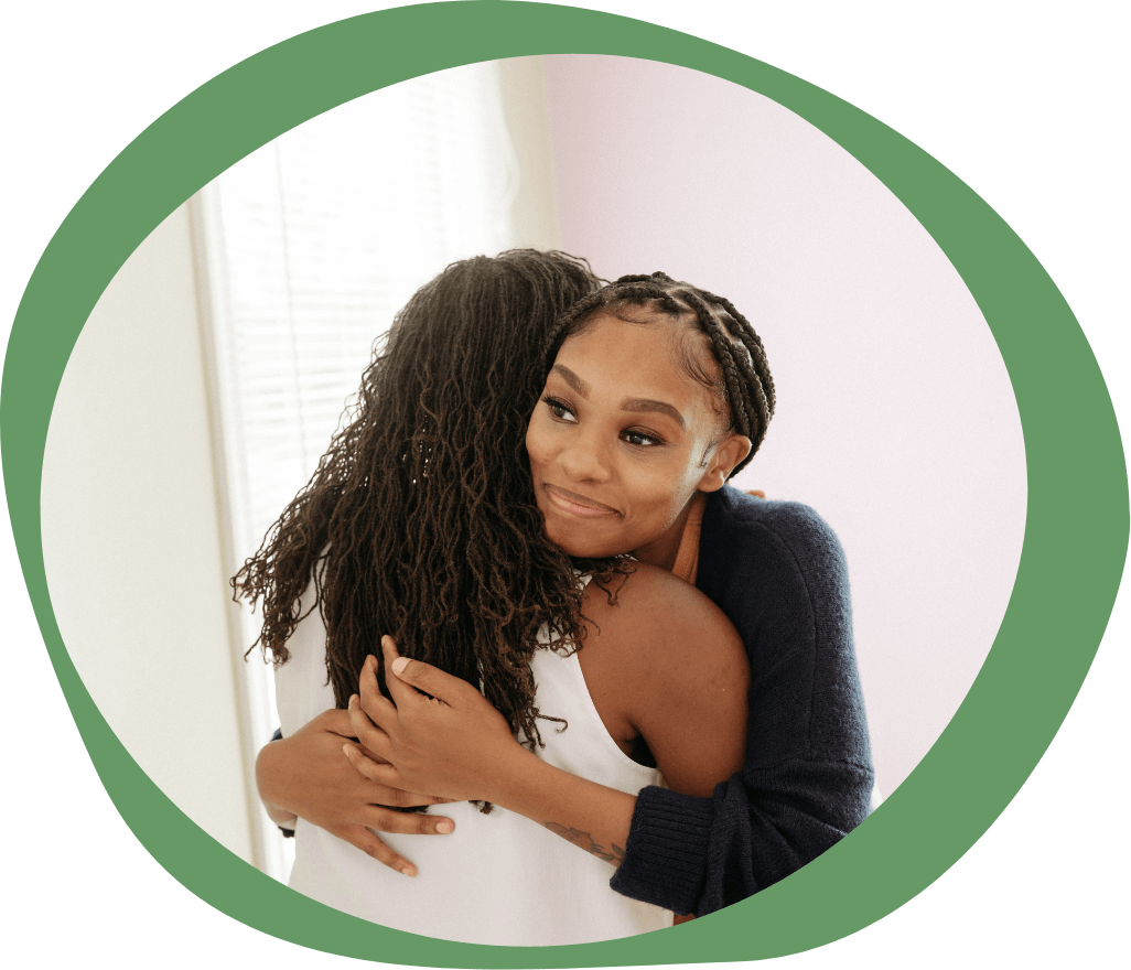 Two women hugging